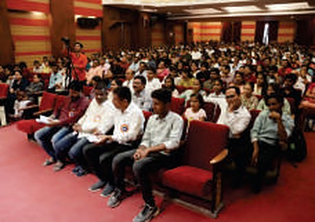 Members of the society and their children attending the felicitation ceremony.