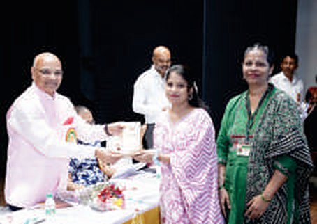 Kum. Simran Shyam Patil (daughter of member Sau. Samidha S. Patil), who passed the B.E. examination in 2022-23, is felicitated by Hon'ble Justice Shri. Jitendra Shantilal Jain.