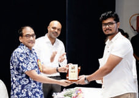 Shri. Raj Manoj Kadam (son of member Sau. Neeta M. Kadam), who passed the Master of Computer Applications examination in 2023-24, is felicitated by Hon'ble Justice Shri. Somasekhar Sundaresan.